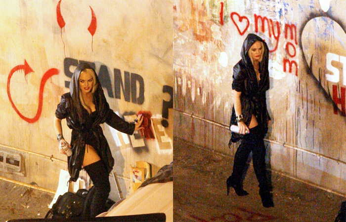 Lindsay Lohan picha muro e foge de paparazzi em clipe - Reprodução