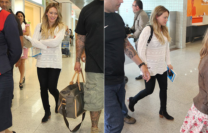 Grávida, Hilary Duff circula com blusa larga em aeroporto - Ag News