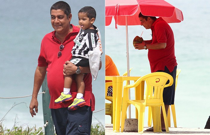 Zeca Pagodinho se diverte com seu netinho na praia, no Rio