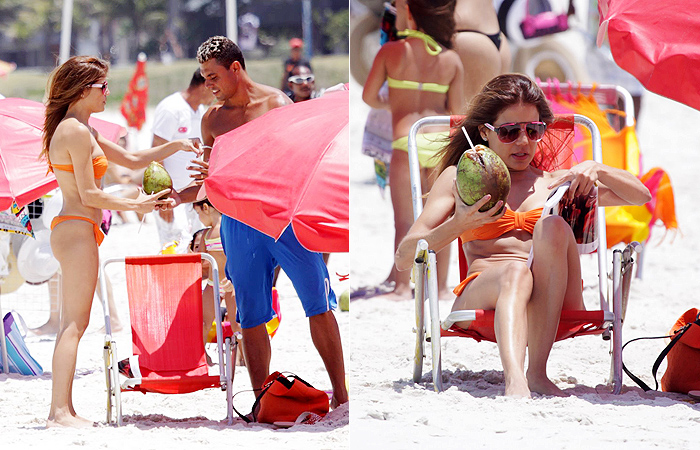 Nivea Stelmman curte praia tomando água de coco e lendo - Ag.News