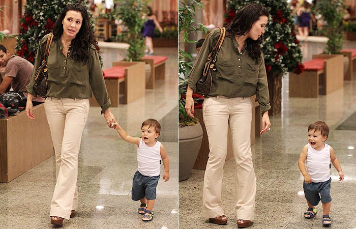 Juliana Knust passeia com o filho em shopping carioca