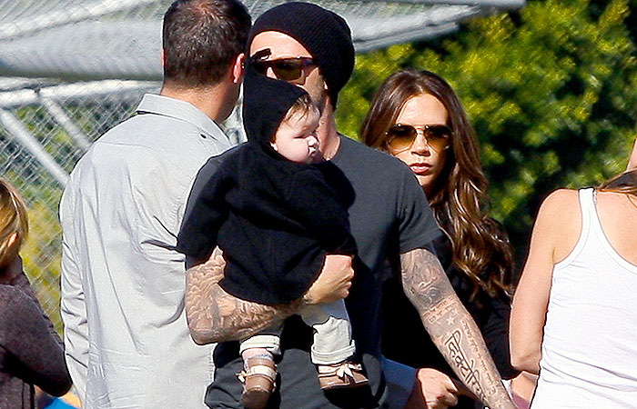  David Beckham paparica Harper Seven em passeio em família