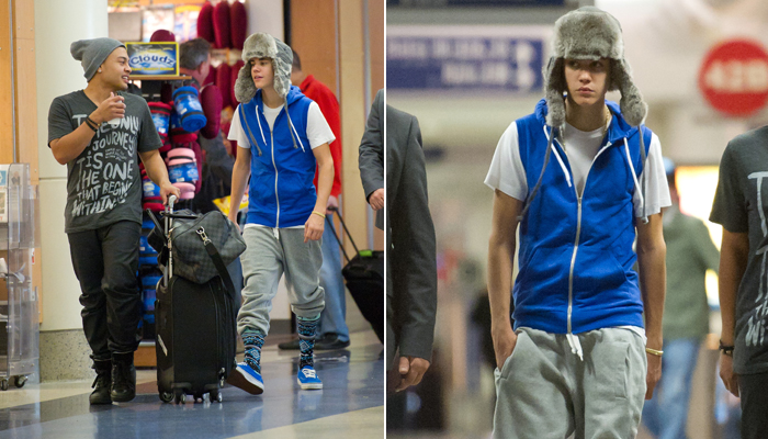 Justin Bieber circula por aeroporto com roupa extravagante