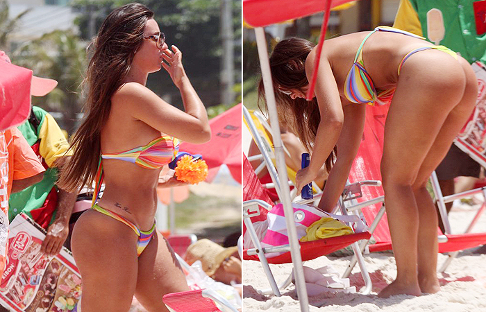 Nicole Bahls se bronzeia na praia do Pepê