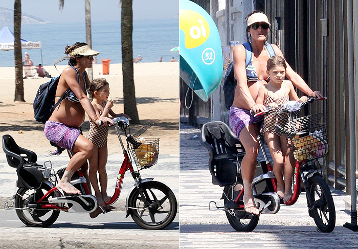 Cynthia Howlett exibe barrigão em passeio de bicicleta com a filha