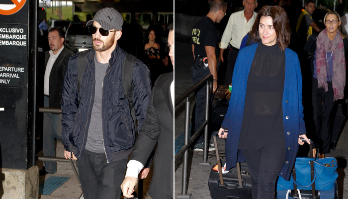 Chris Evans e Mila Kunis desembarcam em São Paulo