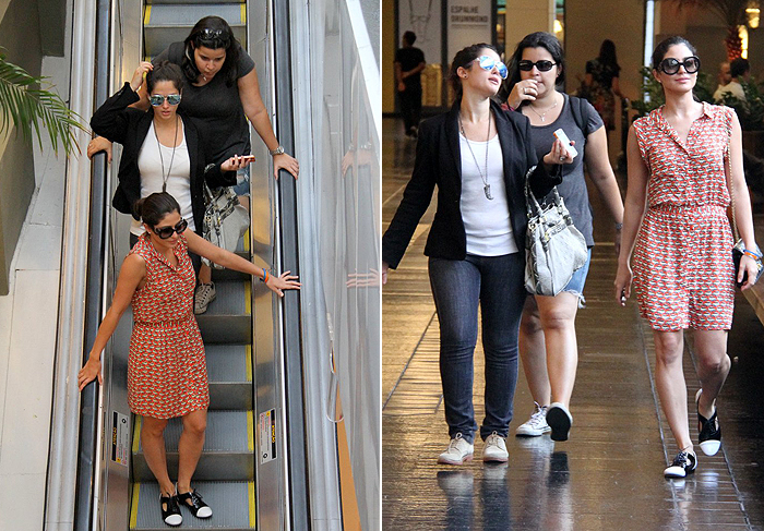 Carol Castro passeia com amigas em shopping carioca