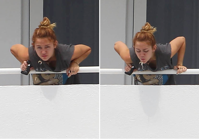 Miley Cyrus dá cusparada de sacada de hotel em Miami