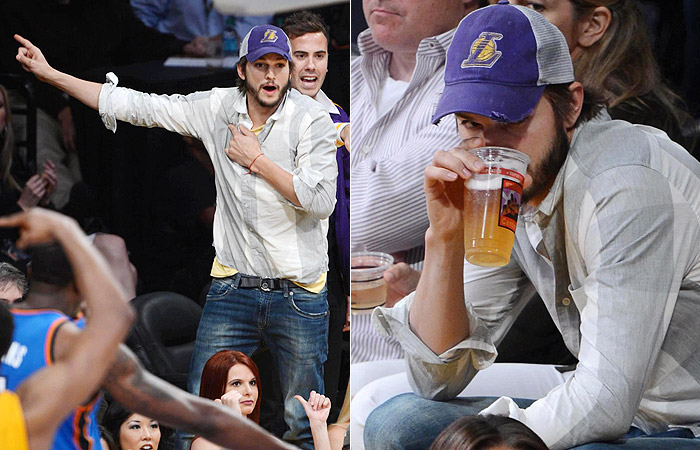 Ashton Kutcher toma copão de cerveja durante jogo de basquete