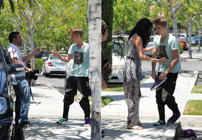 Justin Bieber sai no tapa com paparazzo na rua