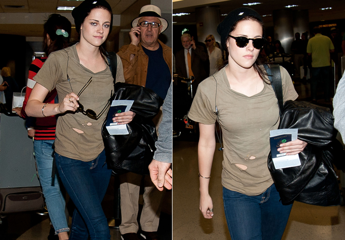 Kristen Stewart é flagrada com camisa rasgada em aeroporto