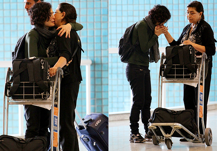 Bianca Castanho ganha beijo na barriga em aeroporto 