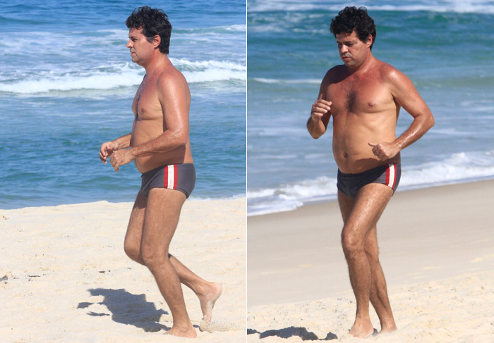 Só de sunga, Felipe Camargo corre por praia carioca