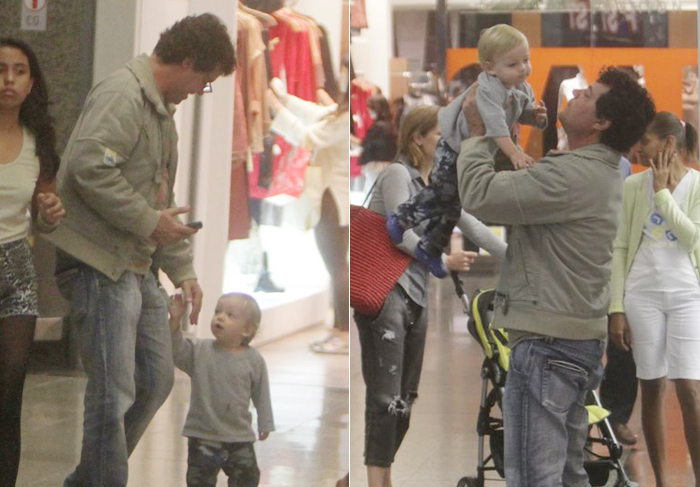 Felipe Camargo brinca com filho em shopping do Rio