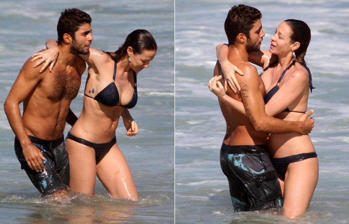 Tarde quente! Luana Piovani beija muito Pedro Scooby na praia