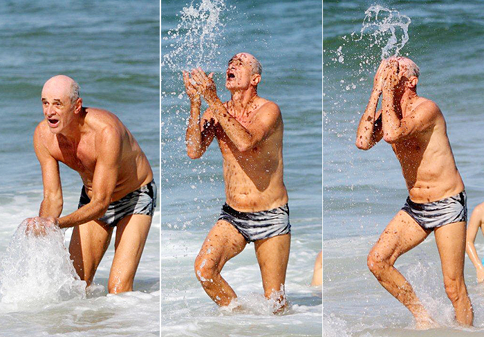 Marcos Caruso pega onda em praia carioca