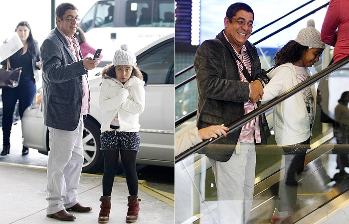 Zeca Pagodinho encontra amigo em aeroporto carioca