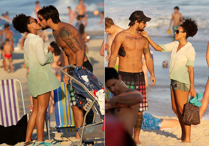 Sheron Menezes curte tarde na praia com o namorado