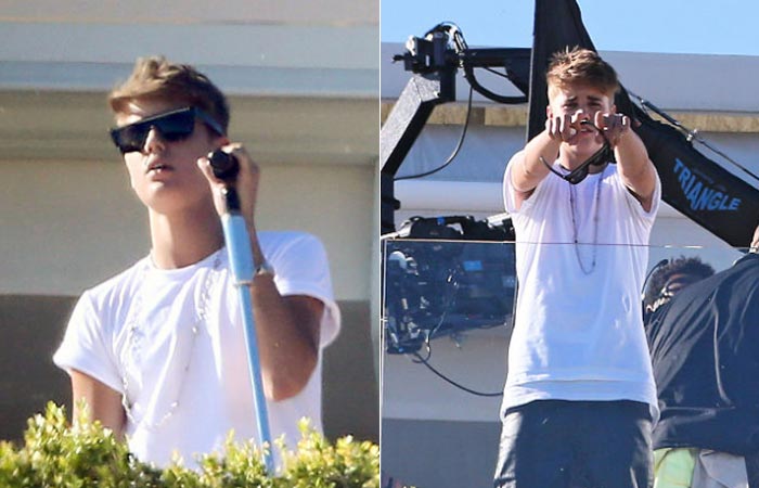 Justin Bieber filma The X Factor com L.A. Reid, em Los Angeles