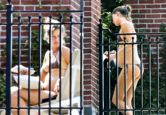 Gisele Bündchen toma sol na varanda com barrigão de fora