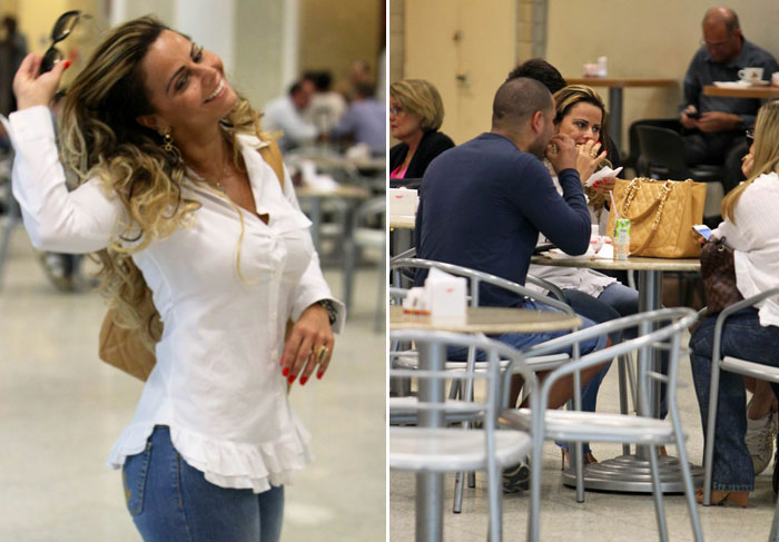 Viviane Araújo faz boquinha no aeroporto