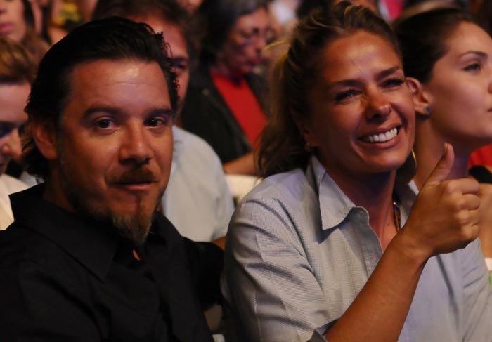 Alexandre Iódice e Adriane Galisteu na plateia de Roberto Carlos