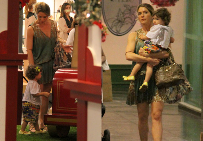 Letícia Spiller caminha em shopping acompanhada da filha