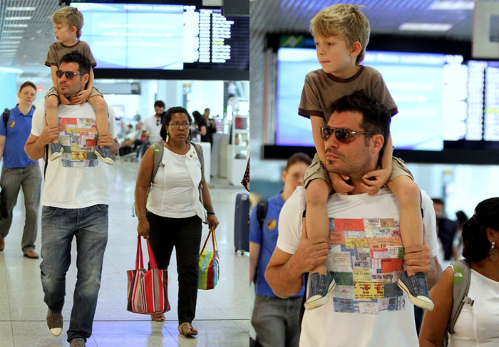 Thiago Lacerda leva o filho nos ombro em aeroporto no Rio