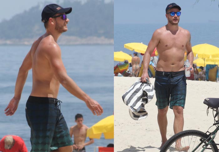 Rodrigo Hilbert caminha sozinho na praia do Leblon O Fuxico