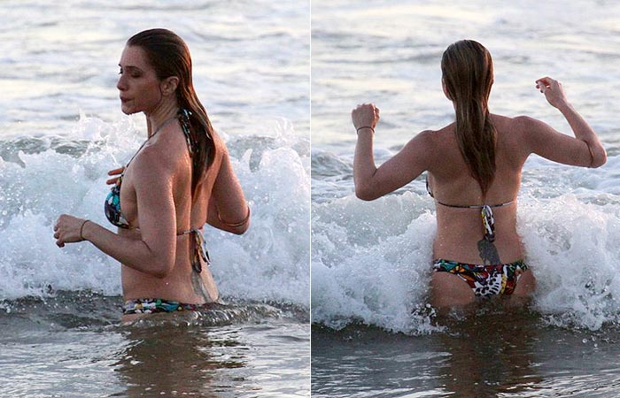 Antes do sol se pôr, Letícia Spiller se joga no mar da Barra