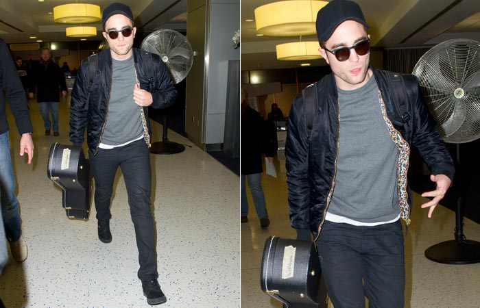 Robert Pattinson é fotografado usandp blusa de Kristen Stewart