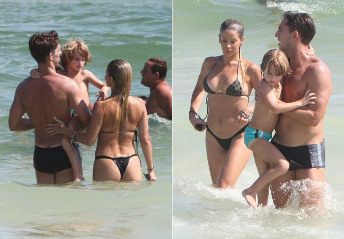 Danielle Winits curte praia com o filho e o namorado 