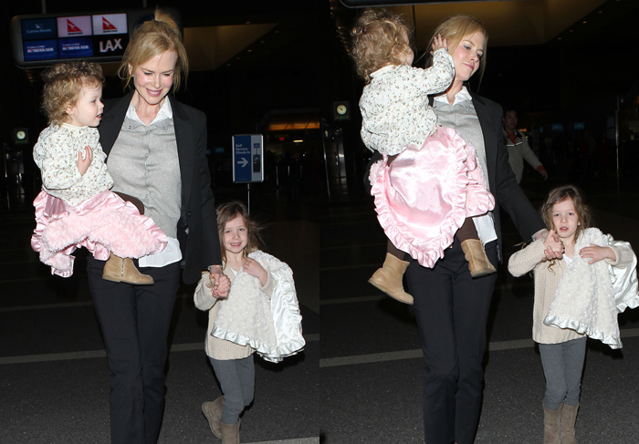  Nicole Kidman circula por aeroporto com as filhas
