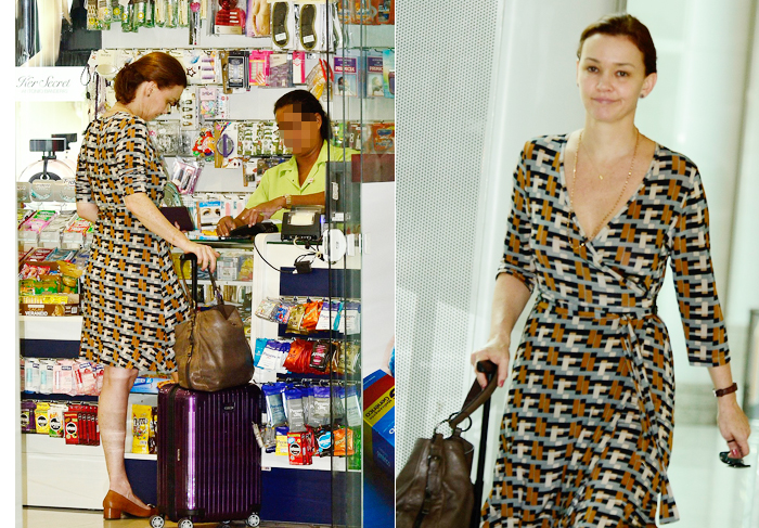 Júlia Lemmertz faz compras na farmácia antes de embarcar