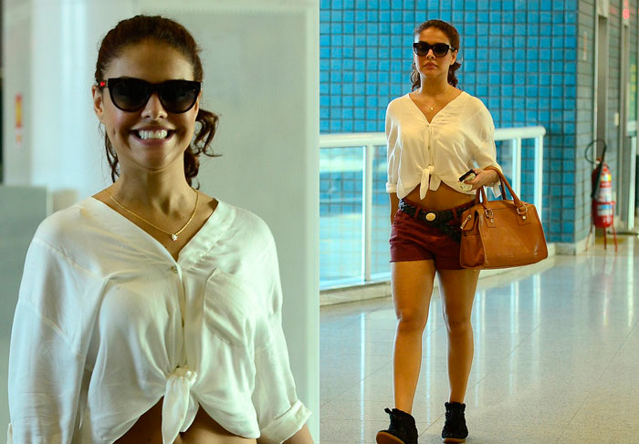 Paloma Bernardi desfila de barriga e pernas de fora em aeroporto