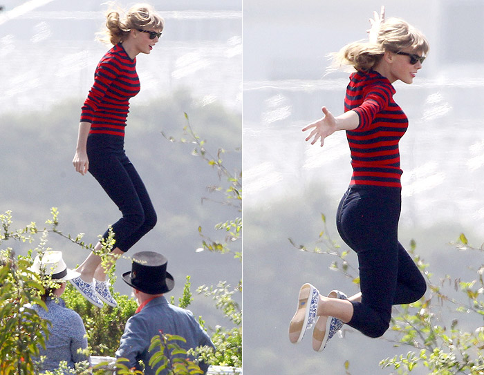 Taylor Swift pula em cama elástica para  sessão de fotos
