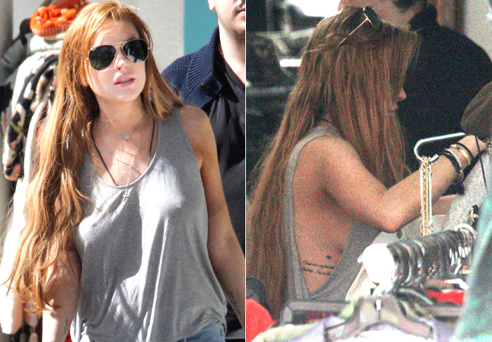 Lindsay Lohan vai às compras sem sutiã e quase mostra demais
