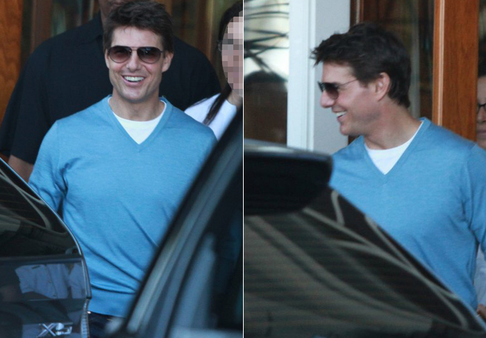 Tom Cruise deixa hotel no Rio de Janeiro muito bem humorado
