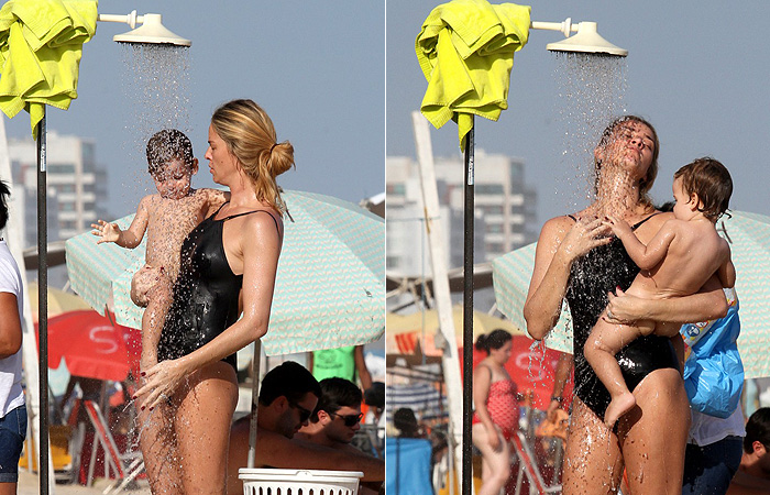 Letícia Birkheuer brinca com o filho na praia de Ipanema