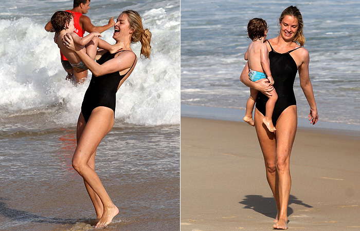 Letícia Birkheuer brinca com o filho na praia de Ipanema