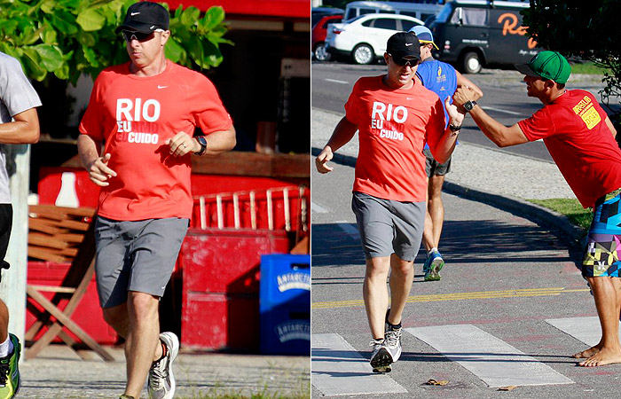 Luciano Huck cumprimenta fã enquanto corre no Rio