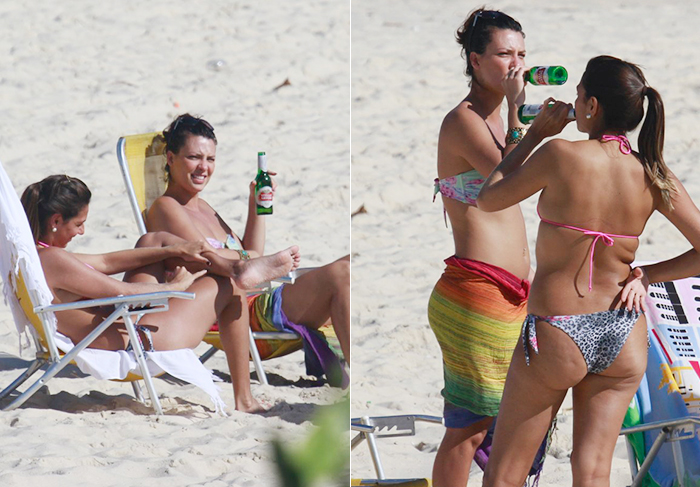 Camila Rodrigues toma cerveja e se diverte com amigas na praia