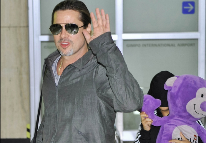 Filho tem crise de timidez ao desembarcar na Coreia com Brad Pitt