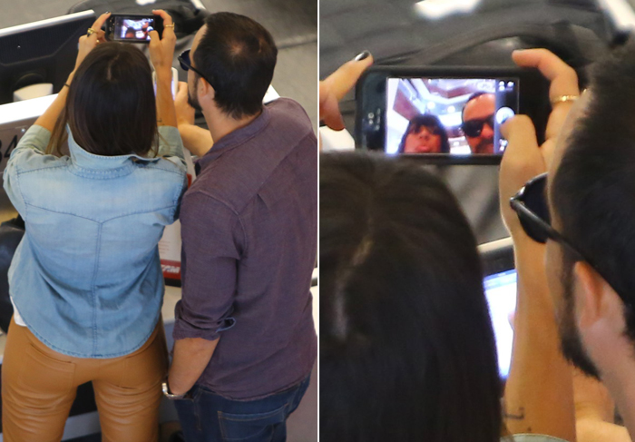 Paulo Vilhena e Thaila Ayala tiram fotos deles mesmos no aeroporto do Rio