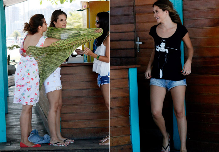 Juliana Paiva, a Fatinha de Malhação, se troca em quiosque na praia