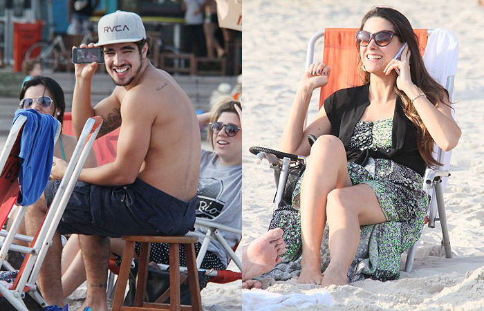 Caio Castro e Fernanda Machado curtem tarde na praia