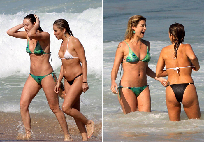 Recém-casados, Luana Piovani e Pedro Scooby vão à praia carioca