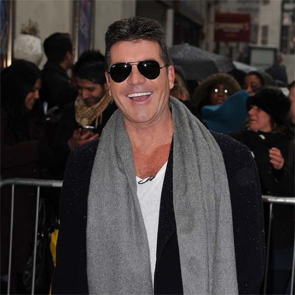 Amante de Simon Cowell não esperava gravidez