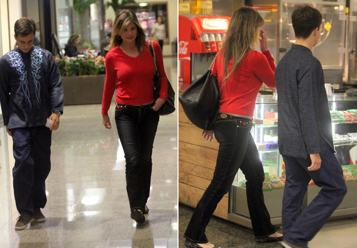  Bem accompanhada, Cristiana Oliveira passeia por shopping 