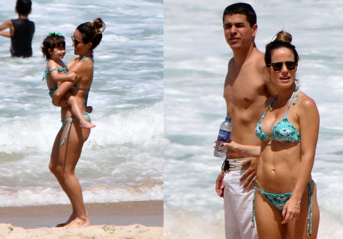 Fernanda Pontes vai à praia com o marido e a filha
